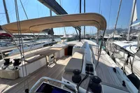 2023 Solaris 50 yacht deck with seating and canopy in marina.