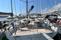 2023 Solaris 50 yacht "My Way" docked in a sunny marina.