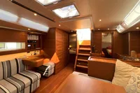 Luxurious interior of 2023 Solaris 50 yacht with wood finish and modern amenities.