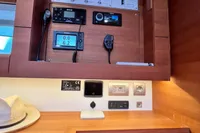Control panel inside a 2023 Solaris 50 yacht, featuring navigation and communication equipment.