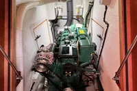 Engine room of a 2023 Solaris 50 yacht, featuring a well-organized mechanical setup.