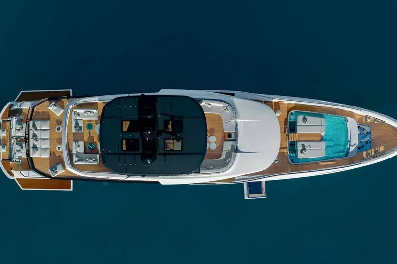 Oceano 44 Yacht Photos Pics Aerial view of 2027 Mangusta Oceano 44 yacht with pool and luxurious deck.