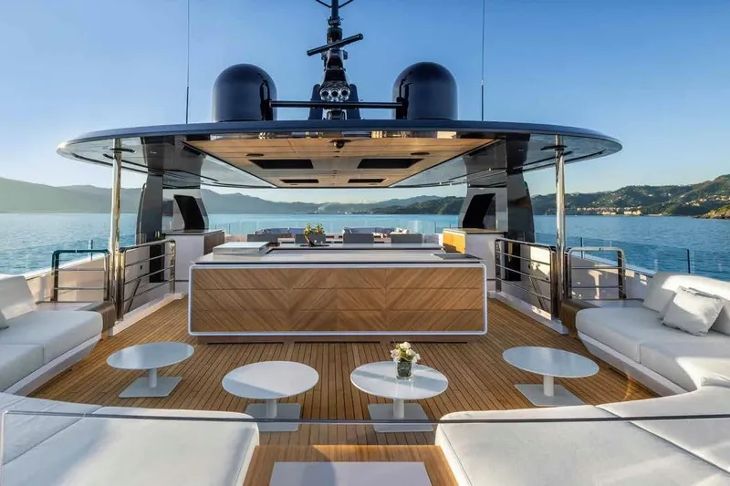 Oceano 44 Yacht Photos Pics Luxurious 2027 Mangusta Oceano 44 yacht deck with modern seating and ocean view.