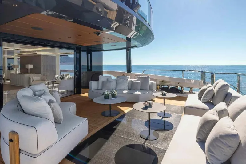 Oceano 44 Yacht Photos Pics Luxurious 2027 Mangusta Oceano 44 yacht deck with elegant seating and ocean view.