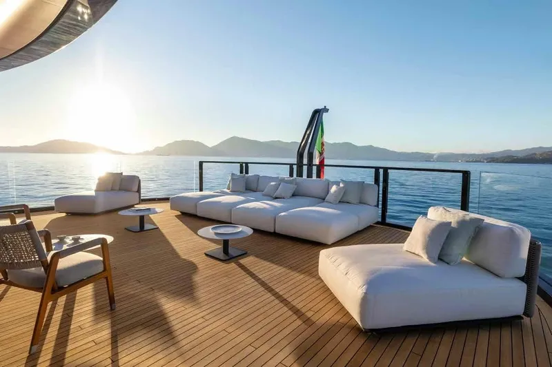 Oceano 44 Yacht Photos Pics Luxurious deck of 2027 Mangusta Oceano 44 yacht with elegant seating and ocean view.