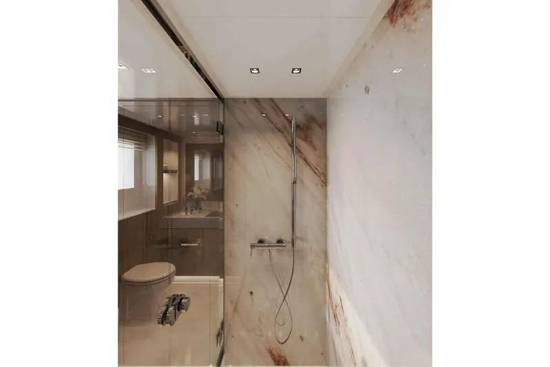 Oceano 44 Yacht Photos Pics Luxurious bathroom interior of 2027 Mangusta Oceano 44 yacht with marble walls and modern fixtures.