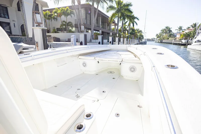 Done Deal Yacht Photos Pics 2015 Yellowfin 32 Offshore boat interior with spacious seating and sleek design.