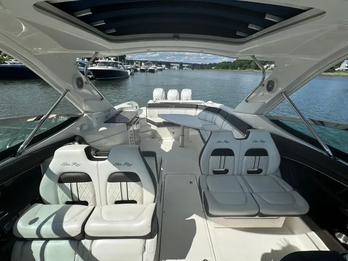  Yacht Photos Pics Luxurious 2017 Sea Ray SLX 350 Outboard boat interior with plush seating and open water view.