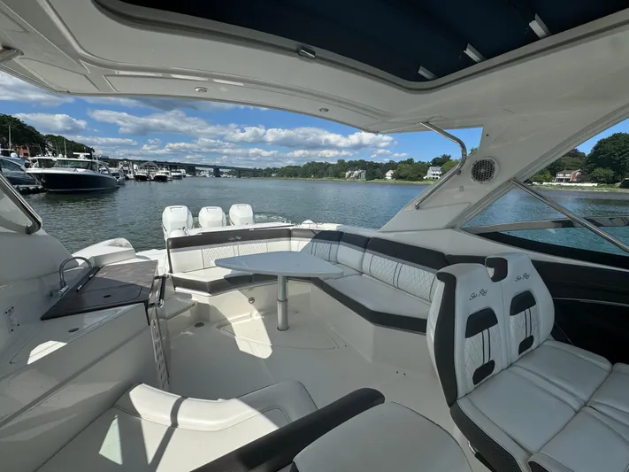  Yacht Photos Pics Luxurious 2017 Sea Ray SLX 350 Outboard boat interior with spacious seating and scenic water view.