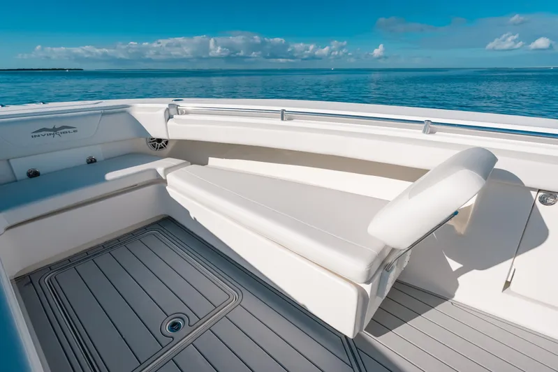  Yacht Photos Pics 2016 Invincible 42 Open Fisherman boat interior with cushioned seating and ocean view.