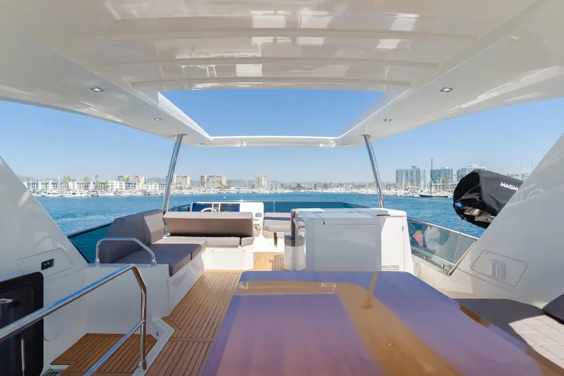 Seaduction Yacht Photos Pics Luxurious 2018 Prestige 630 yacht interior with ocean view and modern seating.