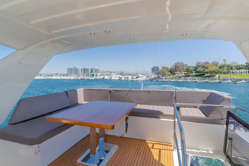 Seaduction Yacht Photos Pics Luxurious 2018 Prestige 630 yacht deck with seating and ocean view.