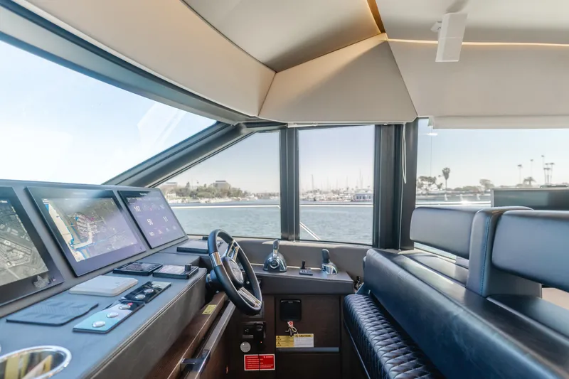 Seaduction Yacht Photos Pics Luxurious 2018 Prestige 630 yacht interior with modern navigation equipment and panoramic views.