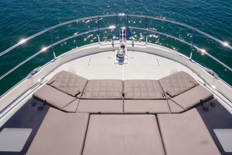 Seaduction Yacht Photos Pics Luxurious 2018 Prestige 630 yacht deck with sun loungers and ocean view.