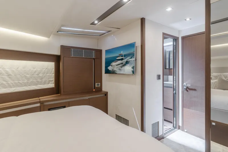 Seaduction Yacht Photos Pics Luxurious interior of 2018 Prestige 630 yacht cabin with modern decor.
