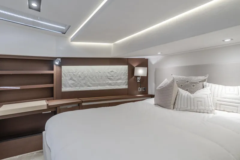 Seaduction Yacht Photos Pics Luxurious bedroom interior of 2018 Prestige 630 yacht with modern design and cozy bedding.
