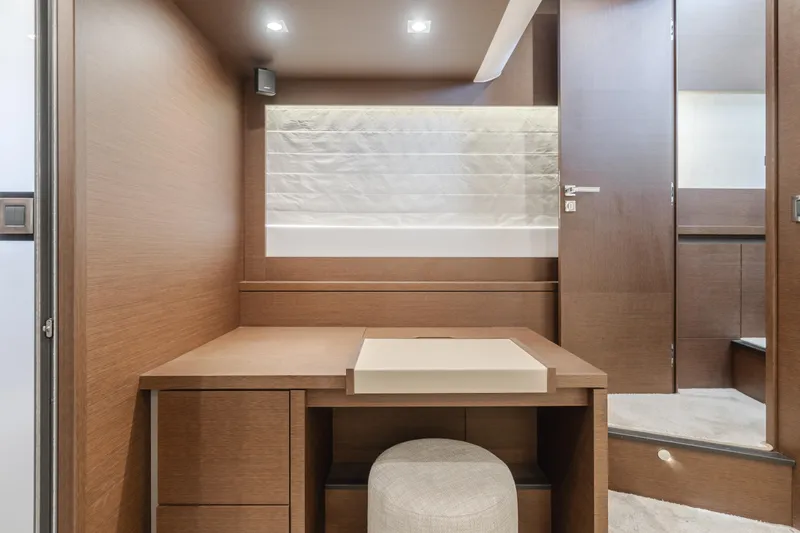 Seaduction Yacht Photos Pics Luxurious interior of 2018 Prestige 630 yacht with modern wood finish and elegant design.