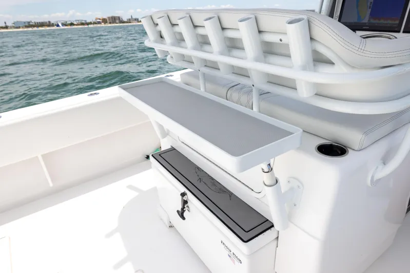  Yacht Photos Pics 2024 Contender 39 ST boat interior with rod holders and storage, on the water.