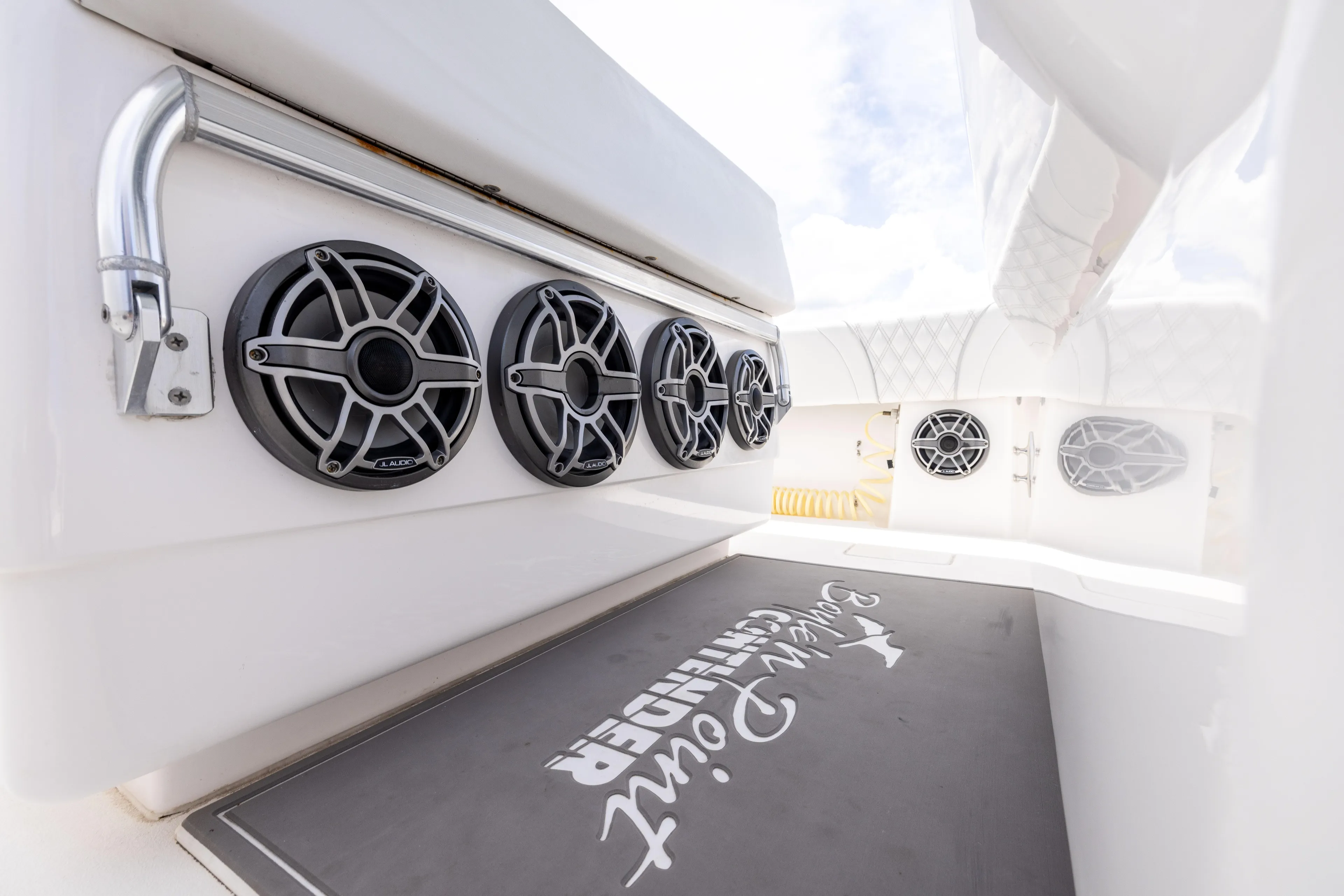  Yacht Photos Pics 2024 Contender 39 ST boat interior with multiple speakers and branded flooring.