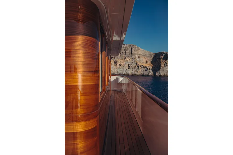 Far Niente Yacht Photos Pics 2024 Hoek Design Motor Yacht, Custom Modern Classic, with sleek wooden deck and scenic ocean view.