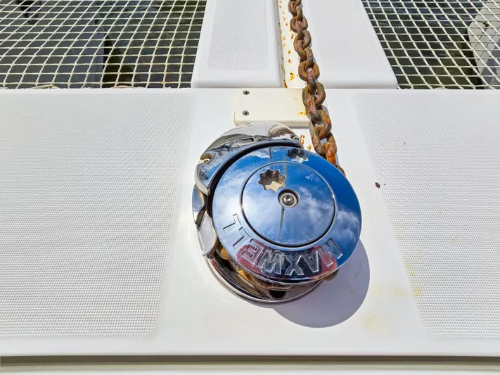 Le Tigre Yacht Photos Pics Anchor windlass on 2019 Lagoon 42 catamaran deck with chain and netting.