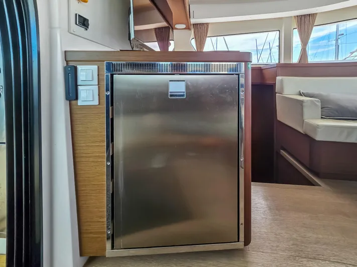 Le Tigre Yacht Photos Pics Interior of 2019 Lagoon 42 yacht featuring a stainless steel refrigerator.