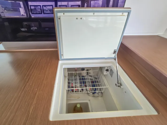 Le Tigre Yacht Photos Pics Built-in cooler on Lagoon 42 yacht, 2019 model, with drinks inside.