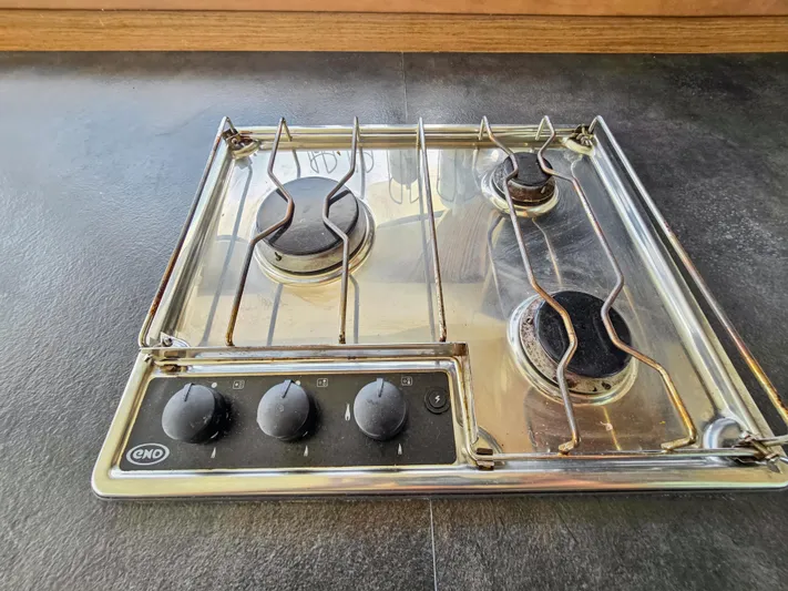 Le Tigre Yacht Photos Pics Three-burner stainless steel stove on Lagoon 42 catamaran, 2019 model.