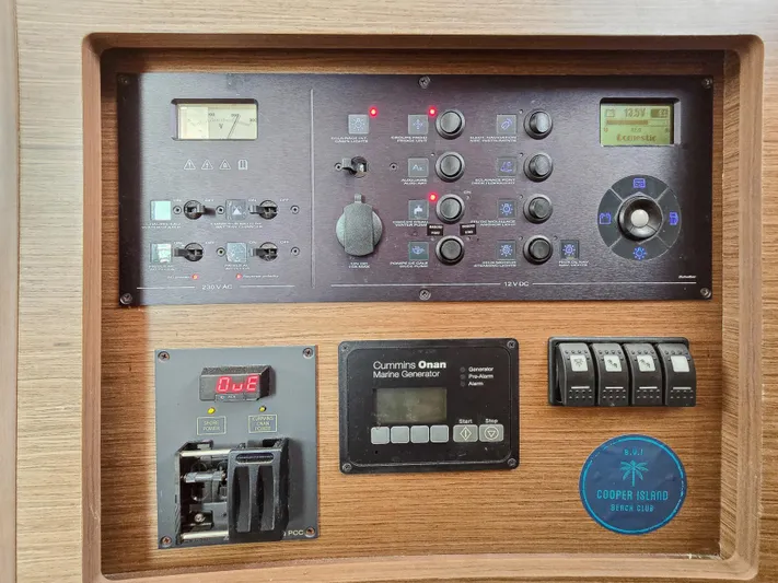 Le Tigre Yacht Photos Pics Control panel of a 2019 Lagoon 42 yacht with various switches and displays.