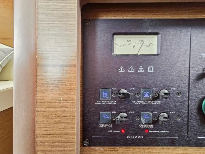 Le Tigre Yacht Photos Pics Control panel of a 2019 Lagoon 42 yacht with switches and voltage meter.