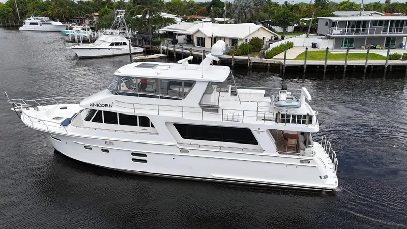 Unicorn Yacht Photos Pics 2020 Hampton 658l Endurance yacht cruising on a calm waterway.