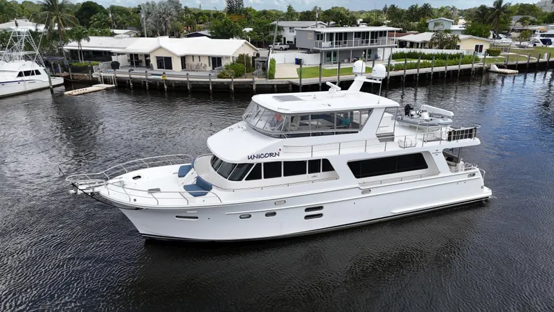 Unicorn Yacht Photos Pics Luxury yacht Hampton 658l Endurance 2020 cruising on a serene waterway.