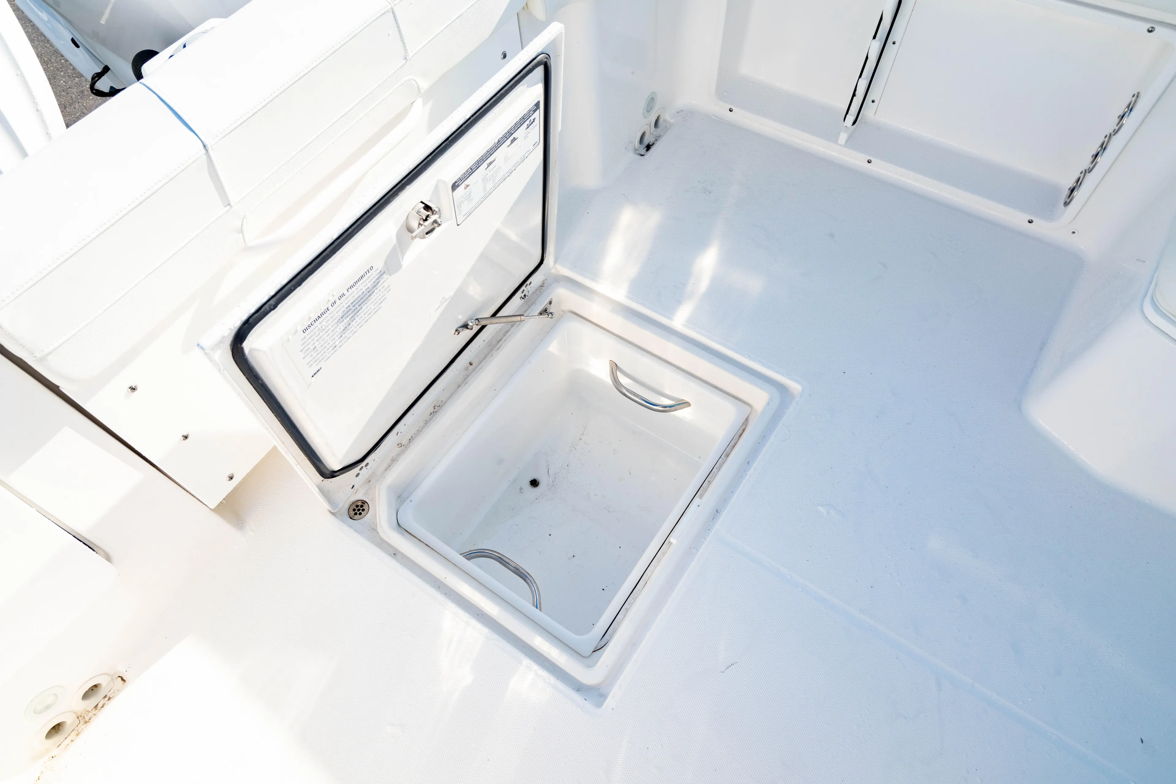  Yacht Photos Pics Open storage compartment on 2022 Edgewater 262 CX boat deck.