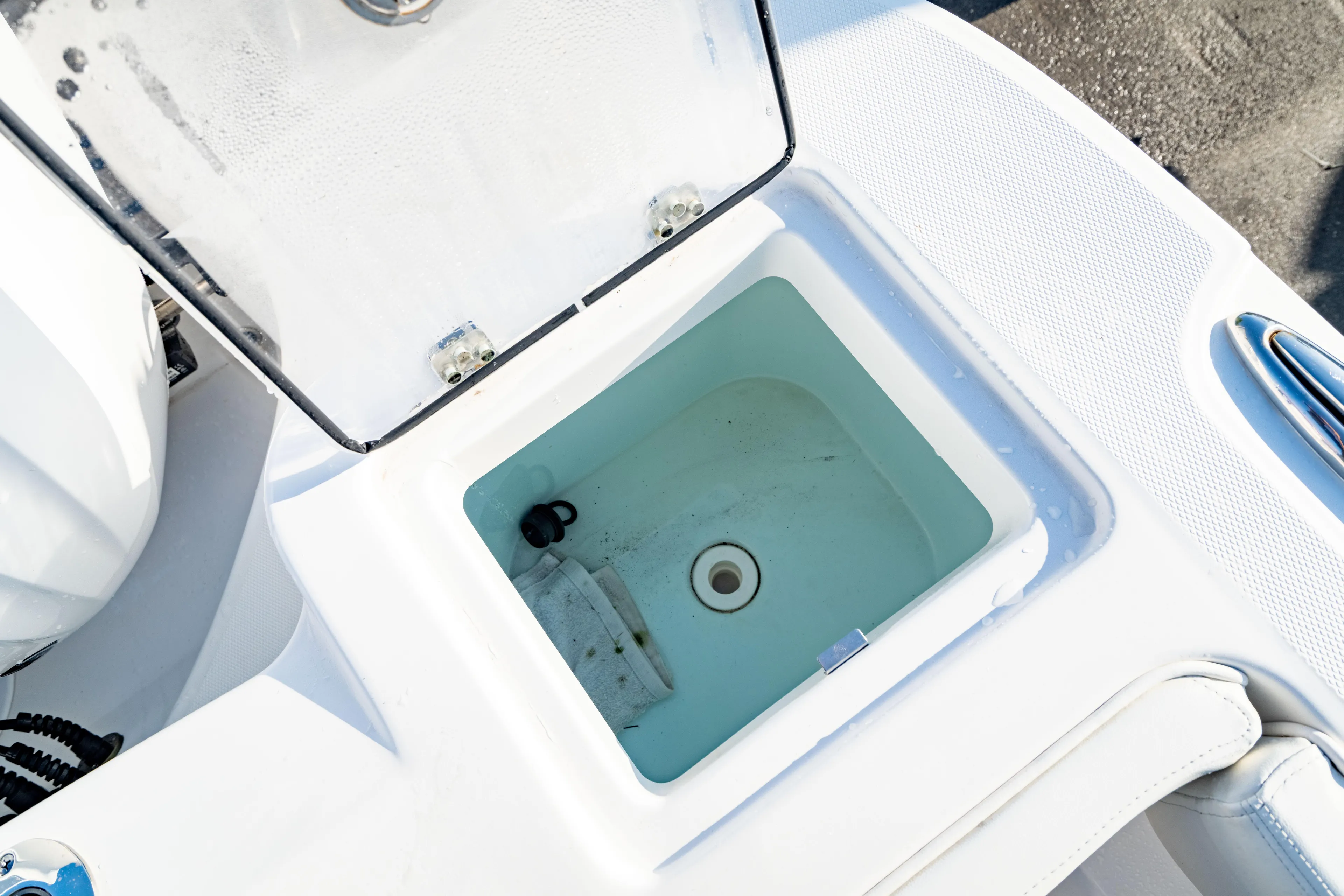  Yacht Photos Pics Open storage compartment on 2022 Edgewater 262 CX boat.