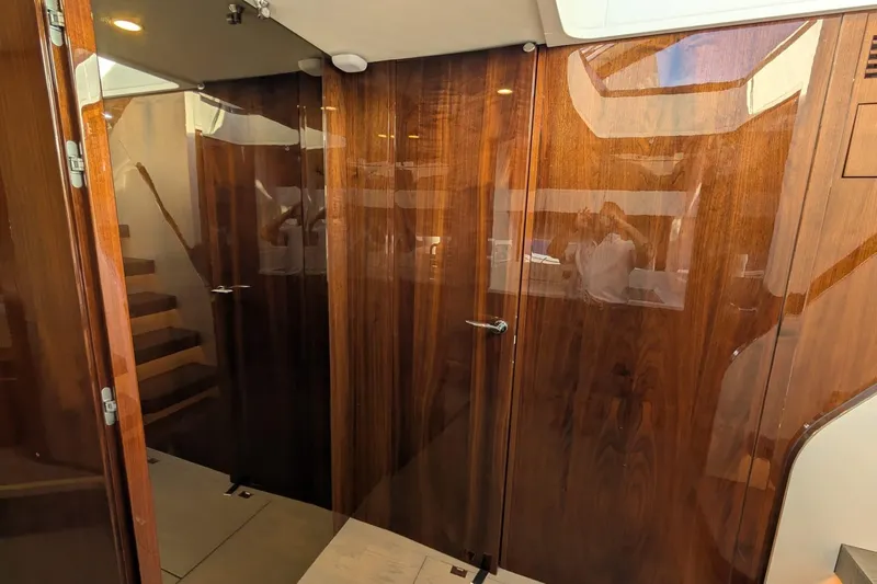 Seakeeper Gyro Yacht Photos Pics Luxurious interior of 2022 Fairline Targa 45 GT yacht with wooden finishes.