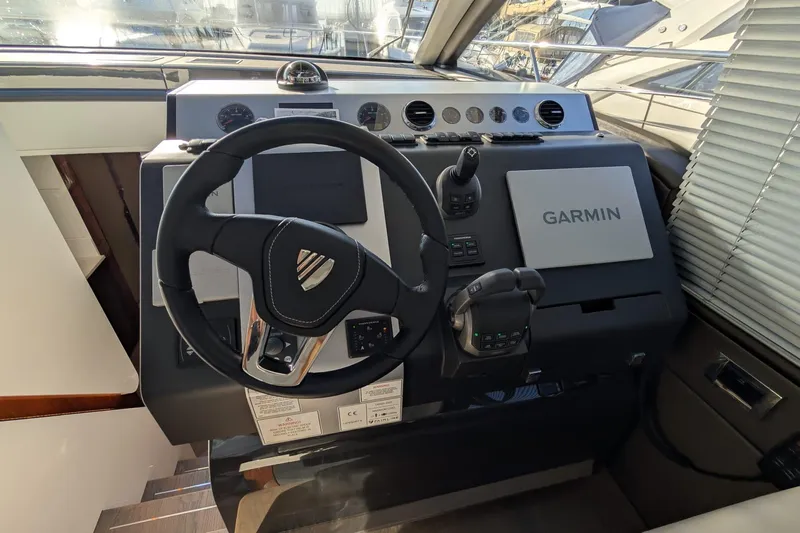 Seakeeper Gyro Yacht Photos Pics Helm of 2022 Fairline Targa 45 GT yacht with Garmin navigation system.