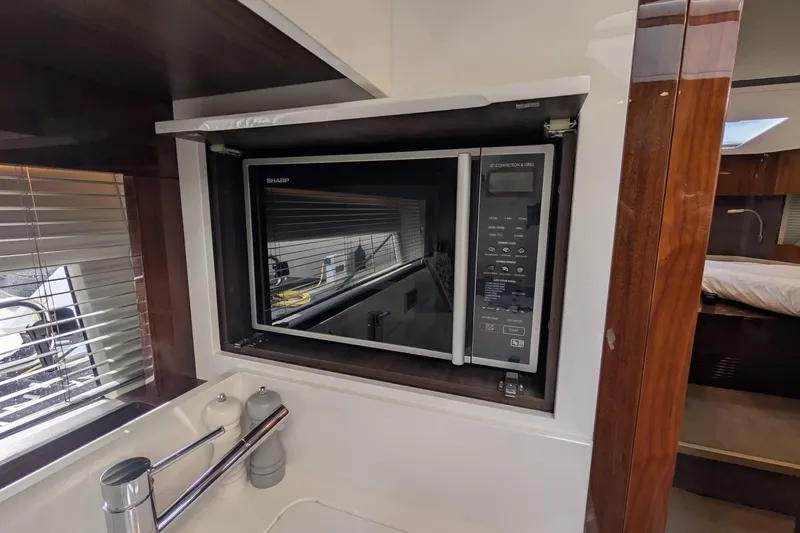 Seakeeper Gyro Yacht Photos Pics Built-in microwave in 2022 Fairline Targa 45 GT yacht kitchen.