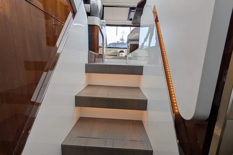 Seakeeper Gyro Yacht Photos Pics Staircase inside 2022 Fairline Targa 45 GT yacht with modern design and ambient lighting.