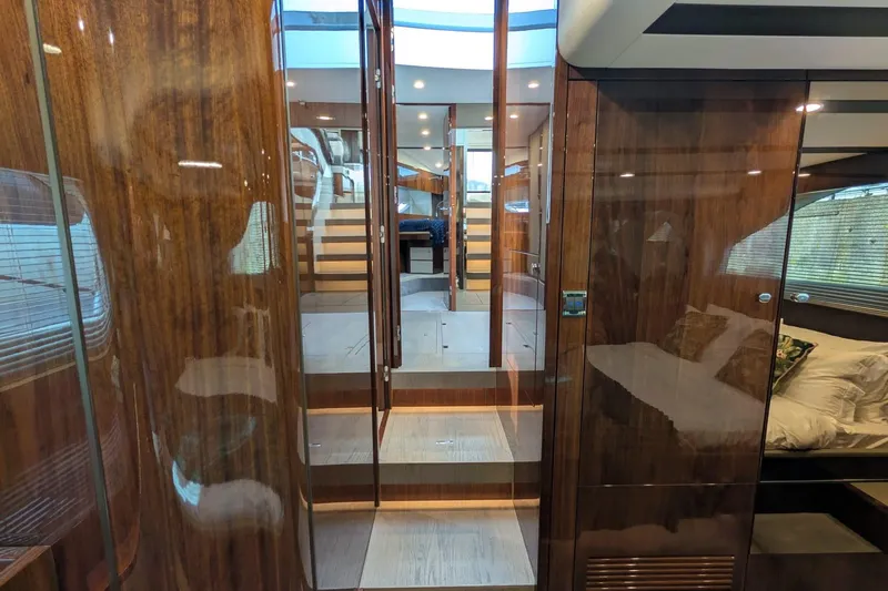 Seakeeper Gyro Yacht Photos Pics Luxurious interior of 2022 Fairline Targa 45 GT yacht with polished wood finishes.