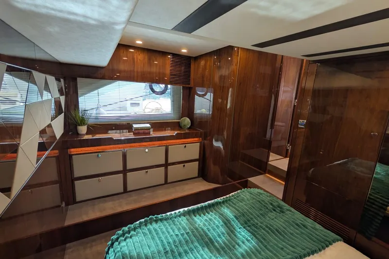 Seakeeper Gyro Yacht Photos Pics Luxurious interior of 2022 Fairline Targa 45 GT yacht with elegant wood finishes.