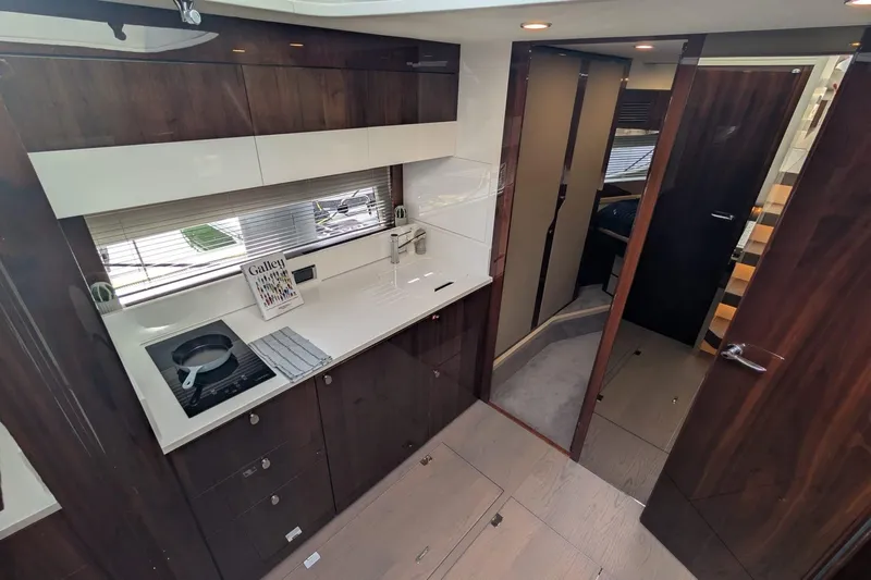 Seakeeper Gyro Yacht Photos Pics Luxurious interior of 2022 Fairline Targa 45 GT yacht galley with modern design.
