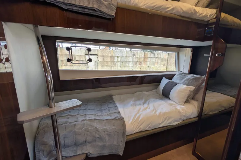 Seakeeper Gyro Yacht Photos Pics Interior of 2022 Fairline Targa 45 GT yacht with cozy twin bunk beds.