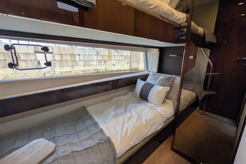 Seakeeper Gyro Yacht Photos Pics Cozy bunk bed cabin in 2022 Fairline Targa 45 GT yacht interior.