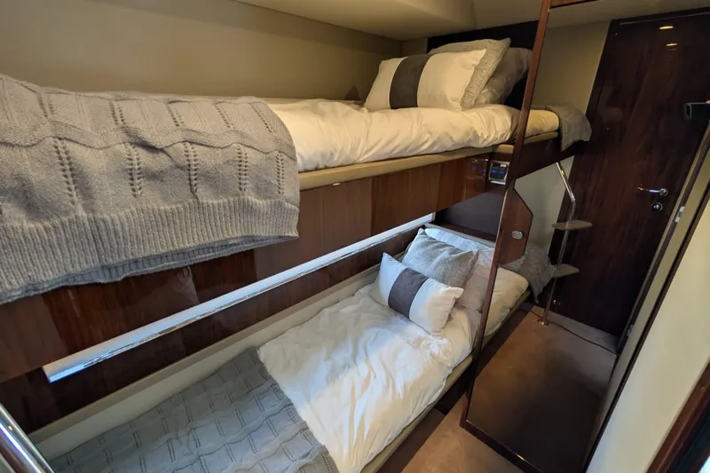 Seakeeper Gyro Yacht Photos Pics Interior of 2022 Fairline Targa 45 GT yacht with cozy bunk beds and modern design.