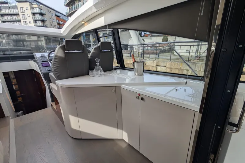 Seakeeper Gyro Yacht Photos Pics Interior of 2022 Fairline Targa 45 GT yacht with modern seating and bar area.