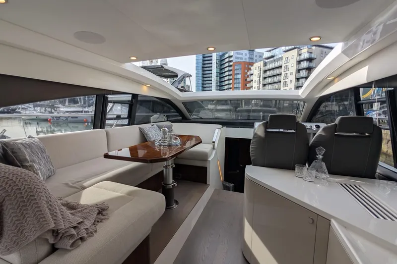 Seakeeper Gyro Yacht Photos Pics Luxurious interior of 2022 Fairline Targa 45 GT yacht with elegant seating and modern design.