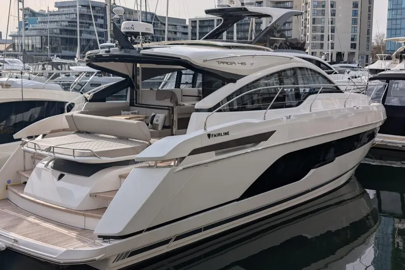 Seakeeper Gyro Yacht Photos Pics 2022 Fairline Targa 45 GT luxury yacht docked in a marina.