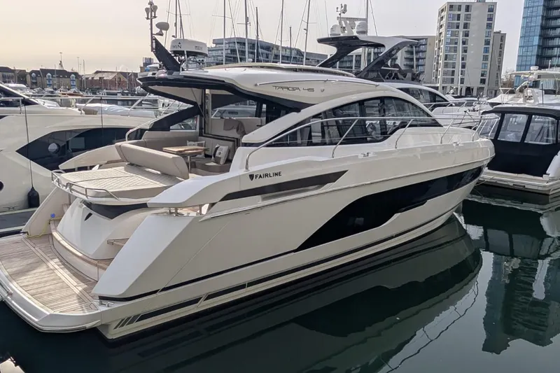 Seakeeper Gyro Yacht Photos Pics 2022 Fairline Targa 45 GT luxury yacht docked in marina, sleek design, modern amenities.
