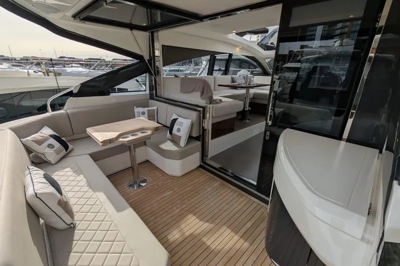 Seakeeper Gyro Yacht Photos Pics Luxurious 2022 Fairline Targa 45 GT yacht interior with elegant seating and modern design.