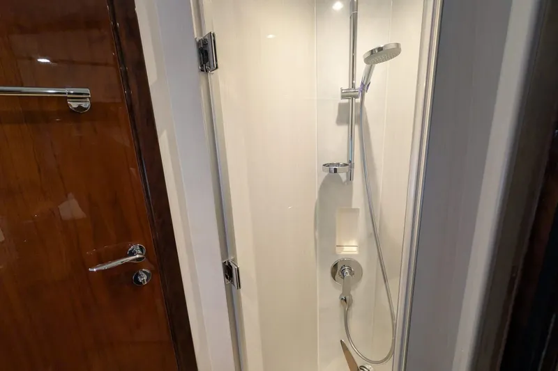 Seakeeper Gyro Yacht Photos Pics Shower area in 2022 Fairline Targa 45 GT yacht, featuring sleek chrome fixtures.